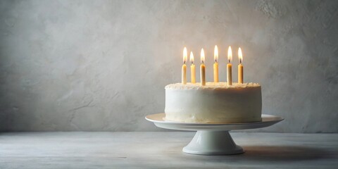 Poster - A delightful round vanilla cake with lit candles on a cake stand