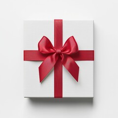 a white gift box with red ribbon isolated on a white background