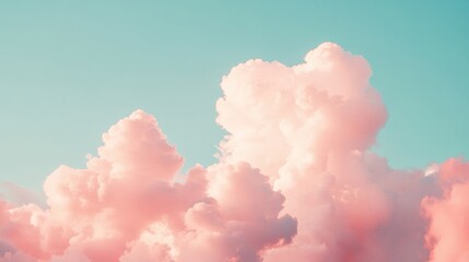 Wall Mural - a vibrant display of pink clouds stretches across the sky during sunset, casting a serene and dreaml