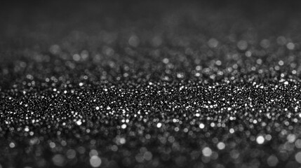 Poster - Glittering particles create a mesmerizing effect in an abstract black background