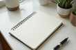 © alivealivea - A single notebook with a clean design on a desk