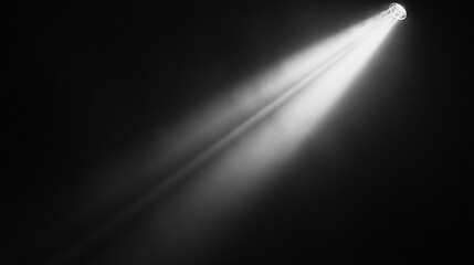 Poster - Spotlight beams illuminating dark stage with mist for dramatic effect