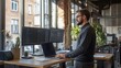© sungedi - Man coding at his modern office workstation using dual monitors