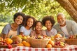 © Anna Lurye - African American family with three kids picnic filled with laughter and love under a large tree on a sunny day