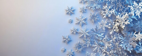 Canvas Print - Abstract blue and silver snowflakes on a soft gradient background, winter festive design, elegant seasonal vibe.