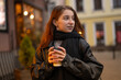 © tan4ikk - Young Girl Drinks Coffee In Evening City