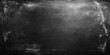 © StockKing - Abstract chalkboard texture background with dark black surface featuring soft white smudges at edges perfect for product placement or advertising text