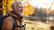 © InspirationDesign - Active senior man enjoying autumn nature. Ideal for healthy aging, outdoor lifestyle, and retirement wellness