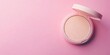 © ShStock - Beige compact case with powder on a soft pink background showcasing smooth surface and open lid for makeup application with elegant copy space