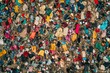 © Gatherina - Aerial view of landfill overflowing with discarded clothing and textile waste