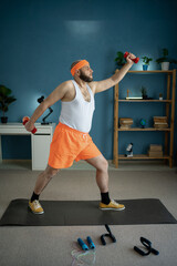 Wall Mural - Funny Man Strikes Pose While Exercising