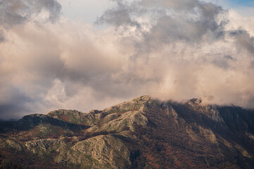 Wall Mural - top view of the village of Grisolia with a cloudy sky in the background, Cosenza