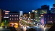 © Mdragon - Night view of a miniature town, under a dark sky, the town buildings shine with lights
