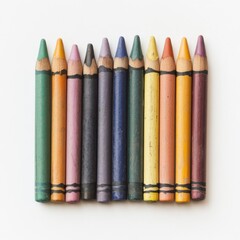 Aufkleber - Colorful crayons arranged in a neat row on a plain white surface inviting creativity and expression