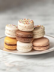Aufkleber - Brightly colored macarons stacked on a plate, showcasing a delightful treat for dessert lovers