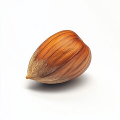 Poster - Roasted hazelnut resting on a smooth surface with a rich color and natural patterns