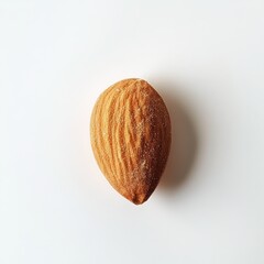 Poster - Roasted almond showcasing a smooth texture and golden hue against a plain background for a minimalist presentation