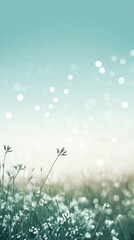 Poster - Calm grassy landscape with delicate flowers under a serene cyan gradient sky