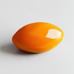 Poster - Vibrant orange mango sits on a smooth surface, showcasing its rich color and smooth texture