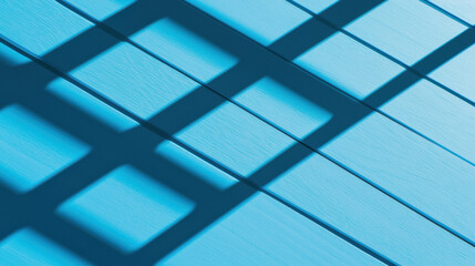 Poster - Bright blue surface with geometric shadows creating striking pattern