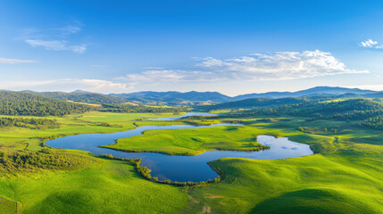 Poster - Breathtaking landscape featuring winding river through lush green fields and rolling hills under clear blue sky