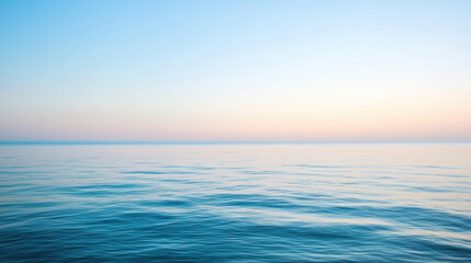 Poster - Serene ocean view at dawn with calm waters and soft pastel sky hues