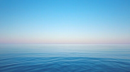 Poster - Serene ocean view with calm waters and clear blue sky at sunset