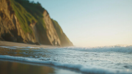 Poster - serene beach scene with gentle waves lapping at shore, cliffs in background. soft light creates tranquil atmosphere