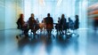 © Katsiaryna - Corporate meeting room with round table showcasing blurred discussions