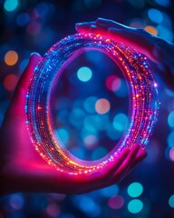 Leinwandbilder - Hands Holding a Glowing Neon Digital Ring Against a Blurred Bokeh Background