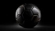 © Matilde - black soccer ball against black background