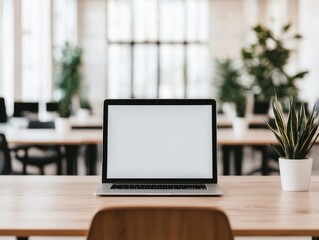 Poster - Laptop with blank screen sitting on desk in modern coworking space
