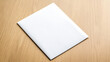 © Bonsales - Pristine white envelope resting on weathered wooden surface, offering ample negative space for design placement
