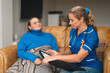 © Iryna - Nurse provides care and support to patient at home during evening hours