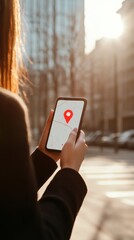 Poster - Businesswoman is using navigation app on smartphone in city street, searching for location and planning route on digital map during sunny day
