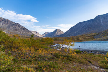 view to petrelius river valley at khibiny mountains. early autumn in arctic tundra region. kola peni