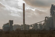 © Grzegorz - Zakład przemysłowy - cementownia - na tle ciemnych chmur w takim postapokaliptycznym klimacie. Cementownia na tle chmur wygląda trochę jak z gier (i książek) o poszukiwaniu artefaktów w Zonie .