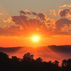 Wall Mural - Sunrise over misty mountain landscape