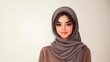 © Majed - Elegant and Smiling Arab Woman Wearing a Hijab, with Copy Space for Text