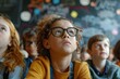 © Minerva Studio - Diverse group of children listen intently in a vibrant classroom environment