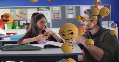 Poster - Image of emoji icons over diverse schoolgirl and teacher counting