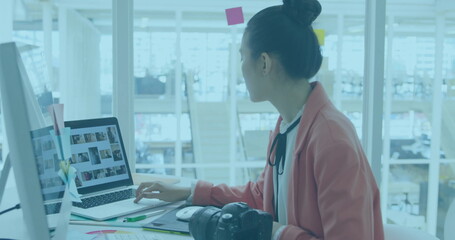 Aufkleber - Image of charts processing data over biracial female creative using camera at office
