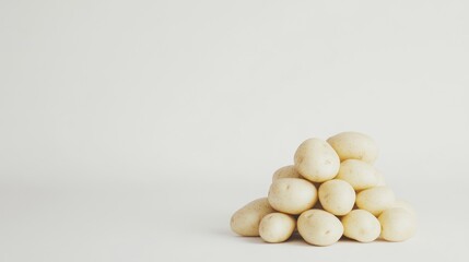 Wall Mural - A Pile of Potatoes on a White Background