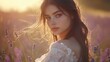 © Zeenat - Young woman with long brown hair stands in a field of lavender at sunset.
