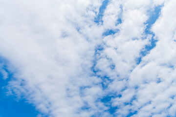 Wall Mural - Beautiful view of blue sky with clouds. Partly cloudy. Background cloud summer. Cloud summer. Sky cloud clear with sunset. Natural sky cinematic sky with clouds background