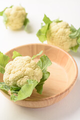 Fresh cauliflower on white background. Local organic farm produce for healthy food ingredients.