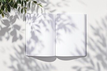 Poster - Open blank book mockup with leaf shadows on light background.