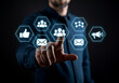 © Shanewaz - Businessman Interacting with Social Media Marketing Icons