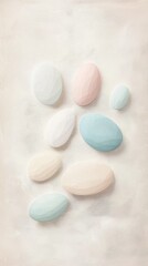 Aufkleber - A collection of minimalist ovals in soft pastel hues rests gently on a light, textured surface. This arrangement evokes tranquility, inviting calm and reflection. The soothing colors blend seamlessly