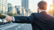 © Lion - Business professional pointing thoughtfully at urban cityscape